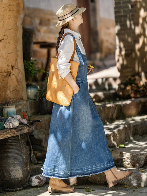 Vestido de tirantes de mezclilla de color puro y estilo artístico para mujer de primavera