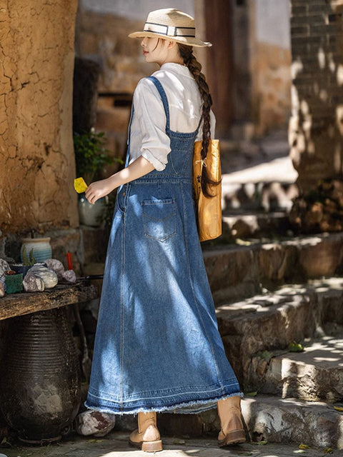 Vestido de tirantes de mezclilla de color puro y estilo artístico para mujer de primavera